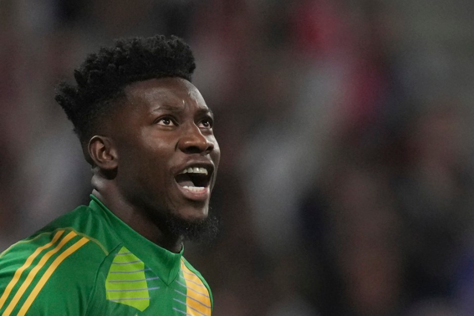 Manchester United's goalkeeper Andre Onana reacts during the Europa League quarterfinal first leg soccer match between Lyon and Manchester United at Groupama stadium in Decines, outside Lyon, France, Thursday, April 10, 2025. (AP Photo/Thibault Camus)