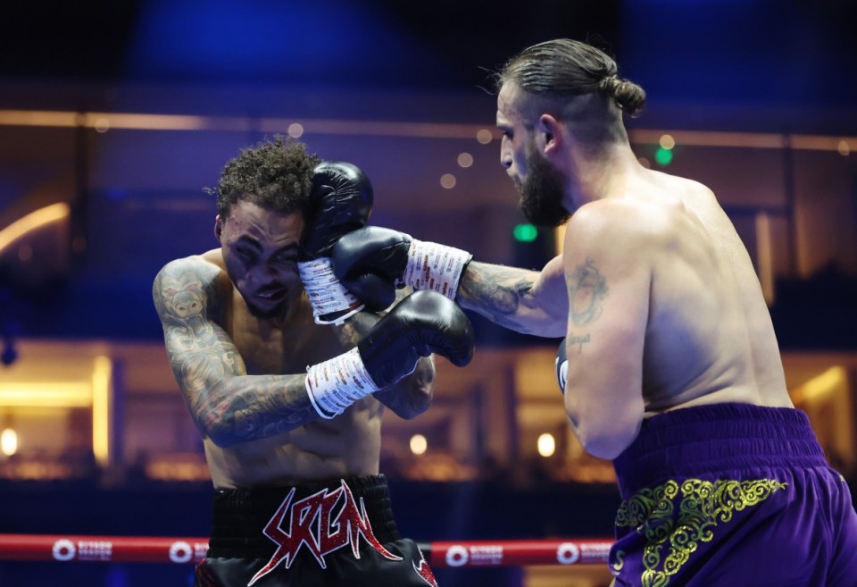 RIYADH, SAUDI ARABIA - OCTOBER 12: Liam Cameron punches Ben Whittaker during the Light Heavyweight fight between Ben Whittaker and Liam Cameron as part of the Riyadh Season - IV Crown Showdown card at Kingdom Arena on October 12, 2024 in Riyadh. (Photo by Richard Pelham/Getty Images)