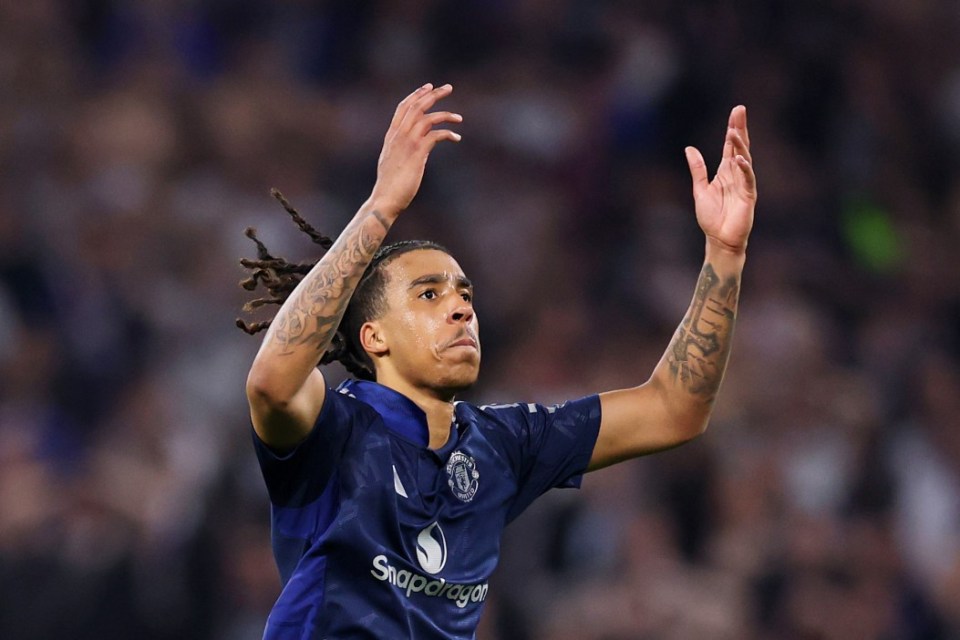 DECINES-CHARPIEU, FRANCE - APRIL 10: Leny Yoro of Manchester United celebrates scoring his team's first goal during the UEFA Europa League 2024/25 Quarter Final First Leg match between Olympique Lyonnais and Manchester United at OL Stadium on April 10, 2025 in Decines-Charpieu, France. (Photo by Michael Steele/Getty Images)