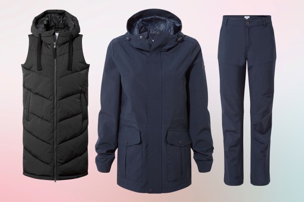 Three pieces of outerwear: a black puffer vest, a navy hooded jacket, and navy trousers.