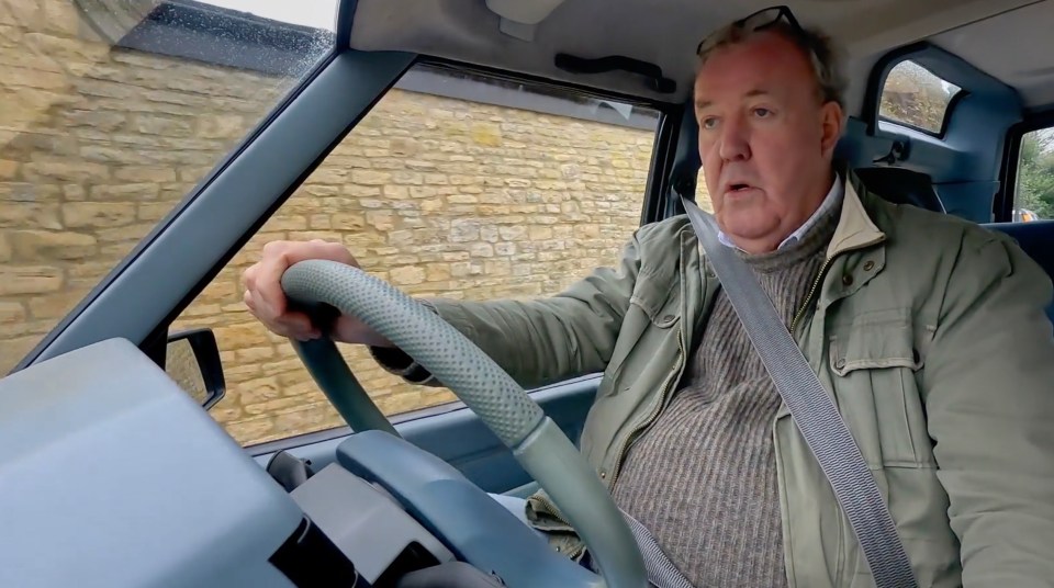 Man driving a car.