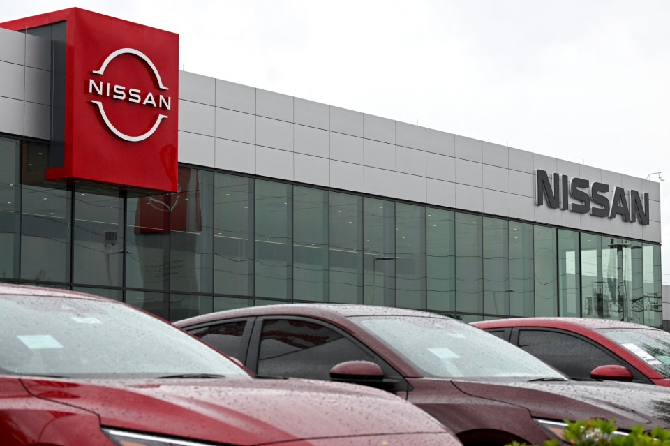 Cars are seen at a Nissan dealership in Houston, Texas, on March 27, 2025. Automakers were battered on March 27 as stock markets fell on both sides of the Atlantic after US President Donald Trump announced significant tariffs on imported vehicles and parts, pressing ahead with tough trade policies many fear will spark a recession. (Photo by RONALDO SCHEMIDT / AFP) (Photo by RONALDO SCHEMIDT/AFP via Getty Images)