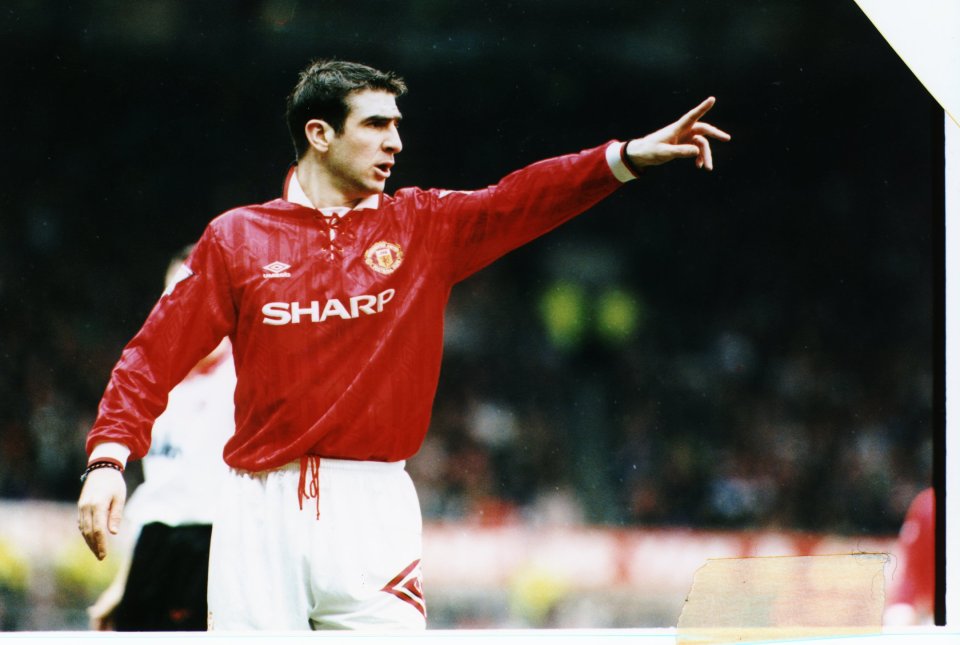Eric Cantona of Manchester United, pointing.
