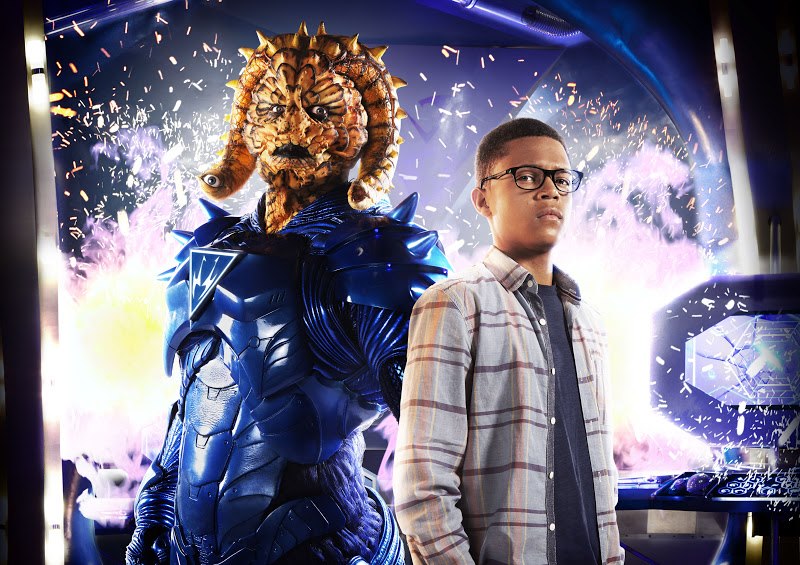 Benny Sherwood and an alien in blue armor from Wizards vs Aliens.