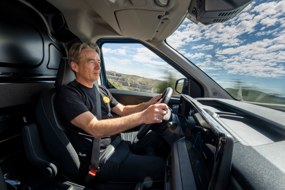 Man driving a van.