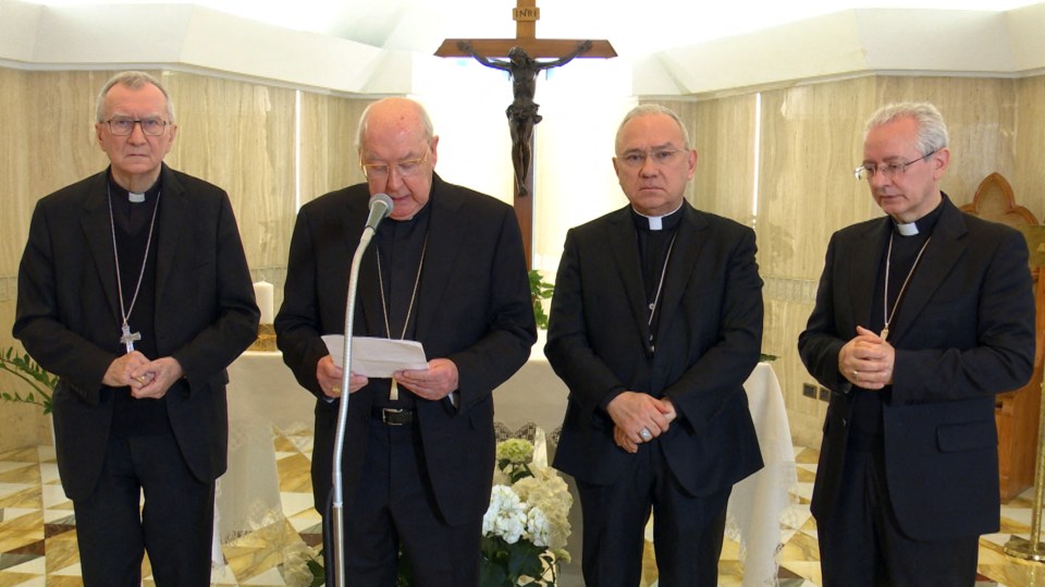 Cardinal Kevin Farrell and other Vatican officials announce the death of Pope Francis in a video statement, at the Vatican, April 21, 2025. Vatican Media/?Handout via REUTERS ATTENTION EDITORS - THIS IMAGE WAS PROVIDED BY A THIRD PARTY. TPX IMAGES OF THE DAY