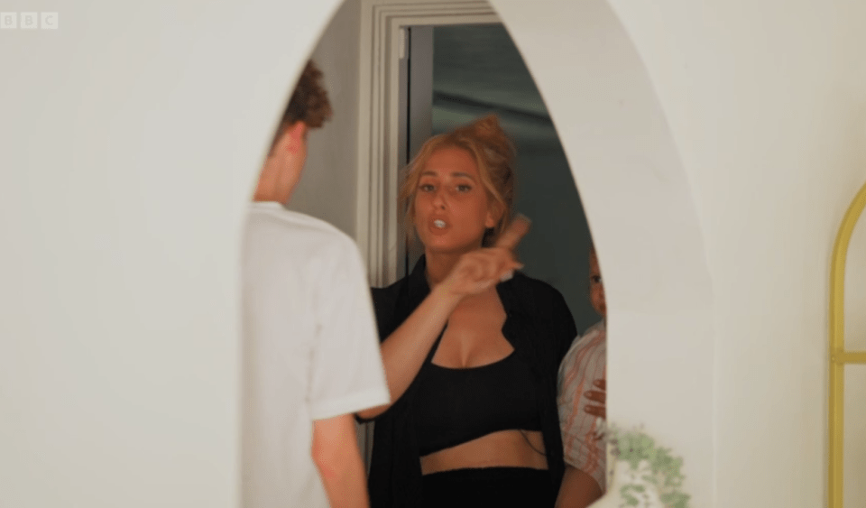 Screenshot of a woman arguing with a man.