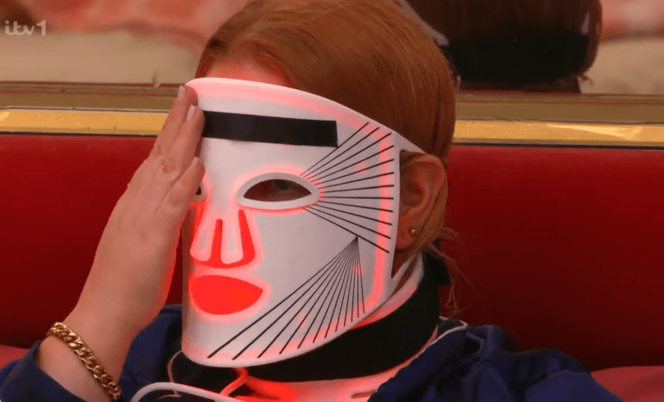 Person wearing a light therapy face mask.