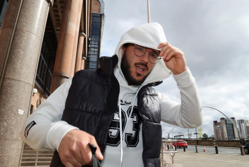 Man leaving court after car crash.