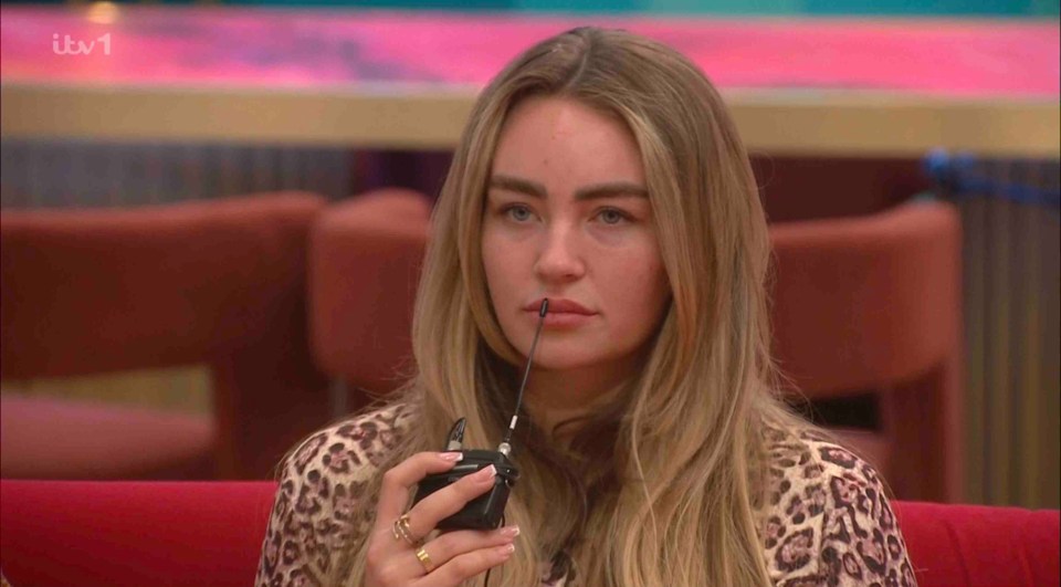 Ella Rae Wise on Celebrity Big Brother, holding a microphone.