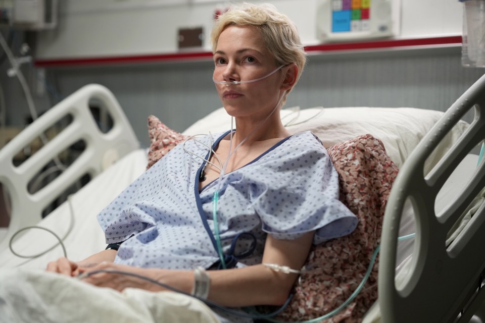 Michelle Williams as Molly in a hospital bed.