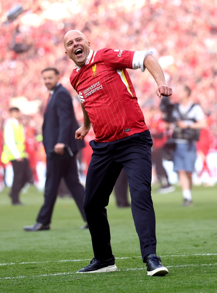 Arne Slot, Liverpool manager, celebrating a Premier League victory.