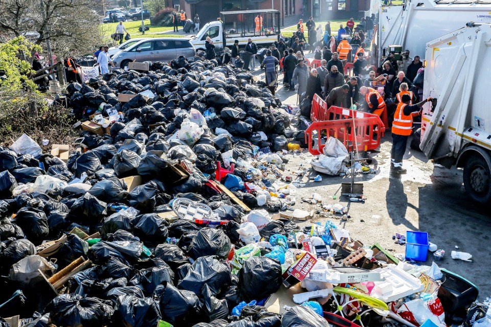 Large pile of garbage bags at a temporary waste disposal site during a bin strike.