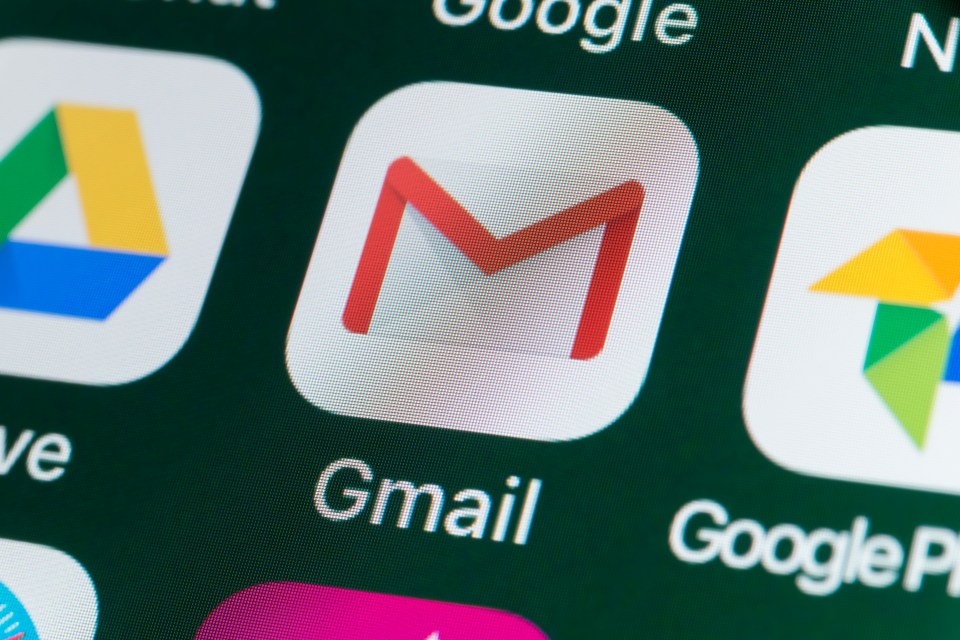 Gmail app icon on iPhone screen.