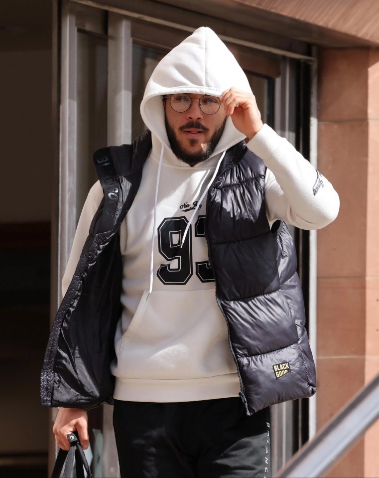 Man leaving court after a car crash.