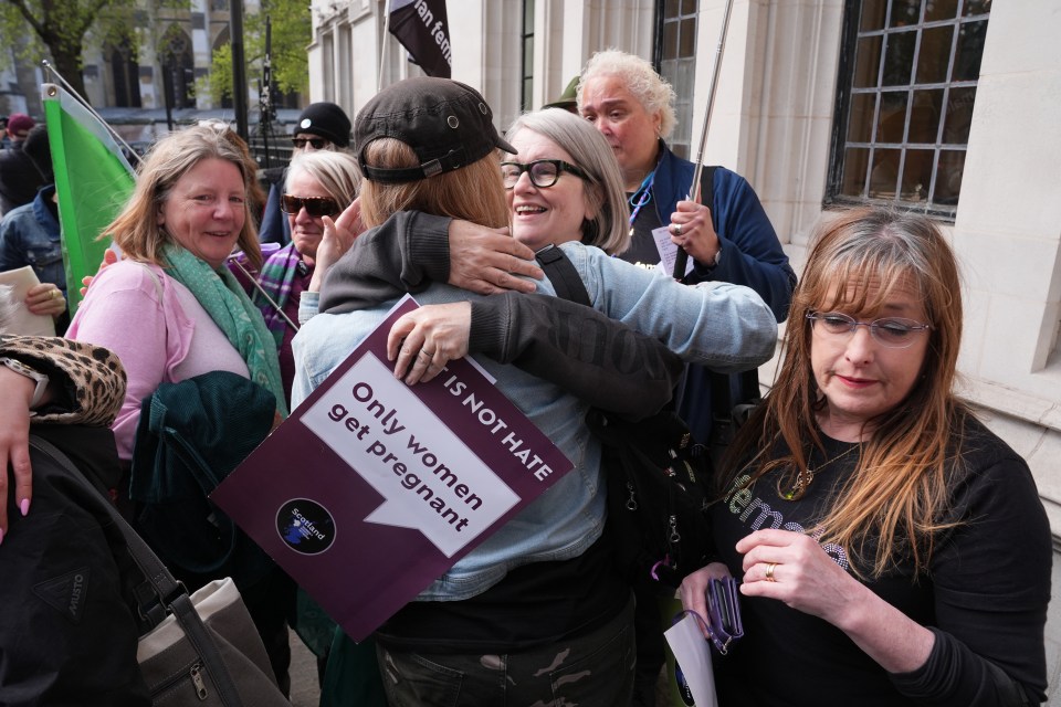 Women celebrating outside the Supreme Court in London after a ruling on the Equality Act.