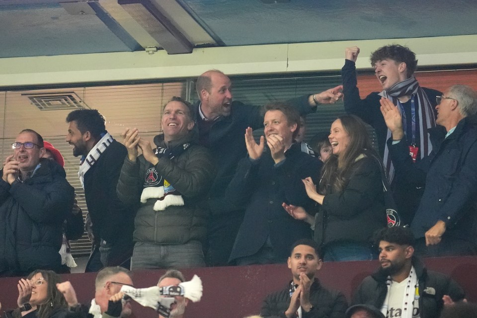 The Prince of Wales and others celebrating at a UEFA Champions League quarter-final match.