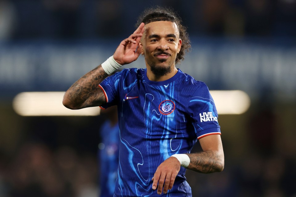 Malo Gusto celebrating after a Chelsea soccer match.