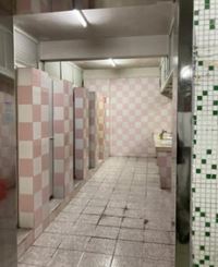 Interior of a Chinese factory restroom.