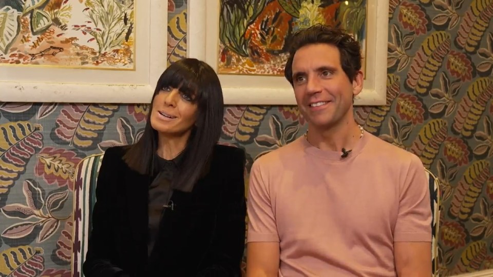 Claudia Winkleman and a man in an interview.