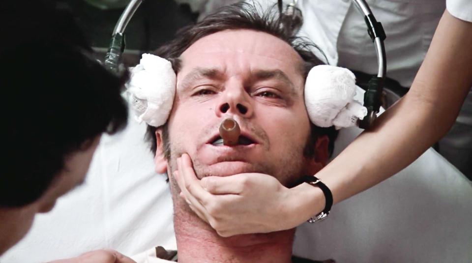 Still from *One Flew Over the Cuckoo's Nest* depicting Jack Nicholson undergoing electroshock therapy.