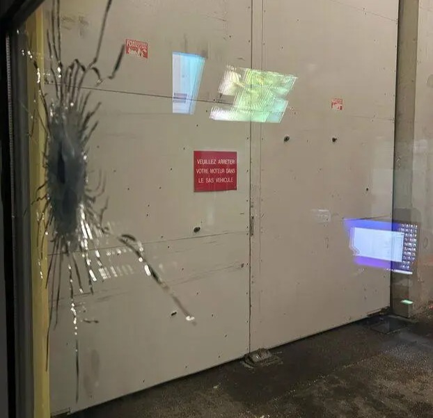 Bullet hole in a window.