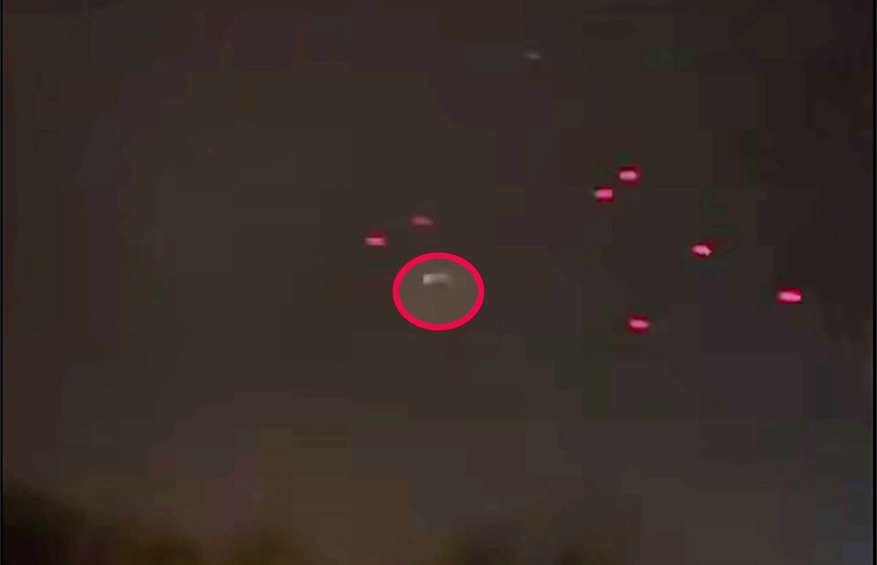 Nighttime video of a possible UFO and several red lights in the sky over Moscow.