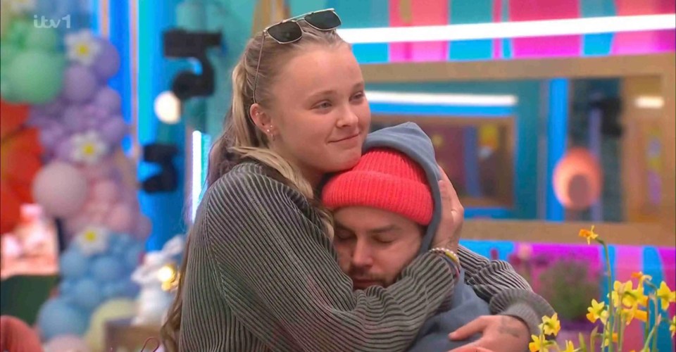 JoJo Siwa hugging Chris Hughes.