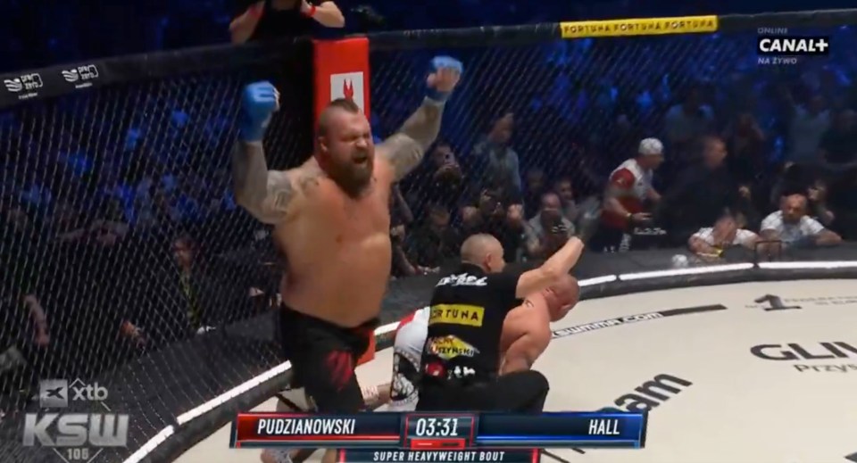 Eddie Hall victorious in a super heavyweight MMA bout.