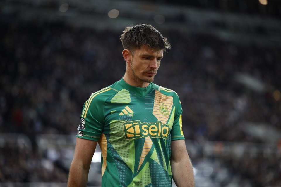 Nick Pope of Newcastle United in his team's jersey.