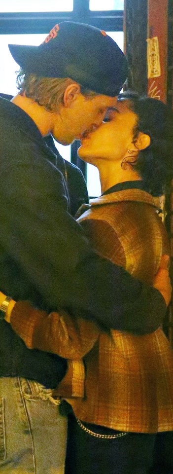 Zoe Kravitz and Austin Butler kissing on a film set.
