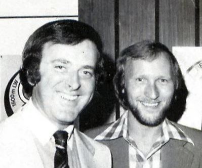 Black and white photo of Terry Wogan, Colin Berry, Jimmy Young, John Dunn, and Pete Murray celebrating 10 years of Radio 2.