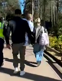 Tommy Fury and Molly-Mae Hague embracing outdoors.