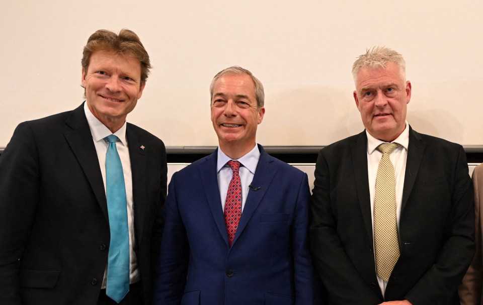 Four Reform UK MPs posing for a photo.