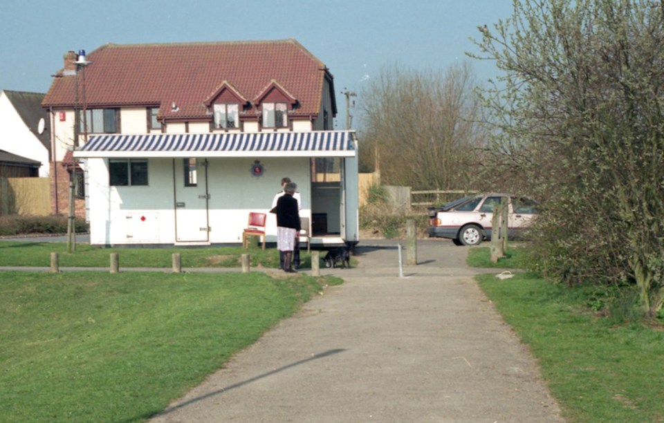 Police reviewing a murder investigation at a crime scene.