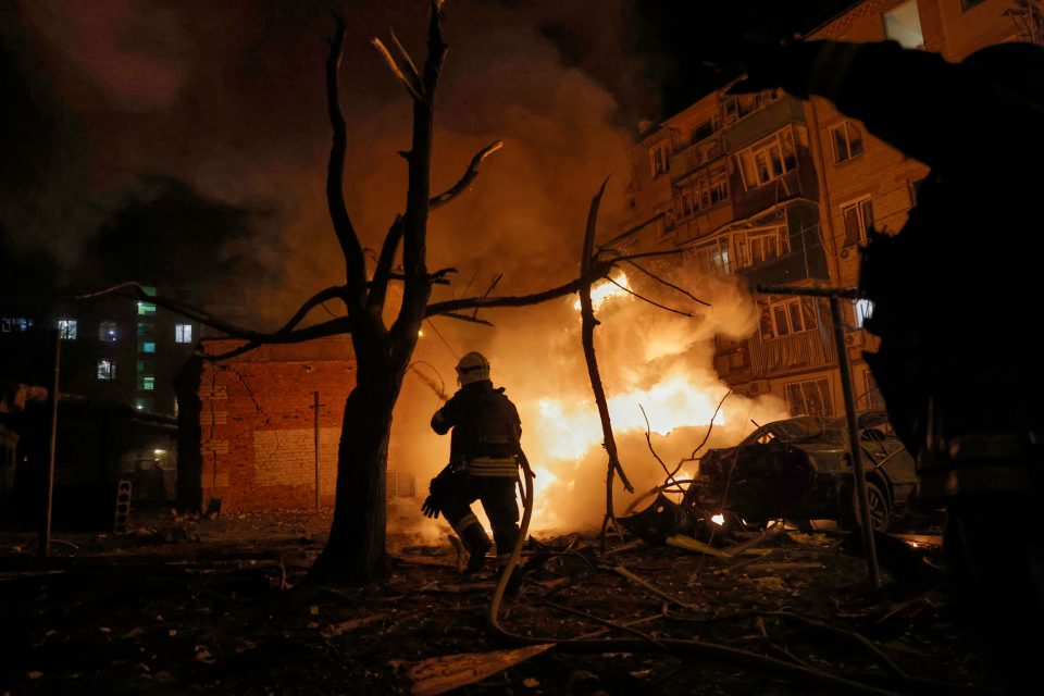 Firefighters battling a fire in Kharkiv, Ukraine, after a drone attack.