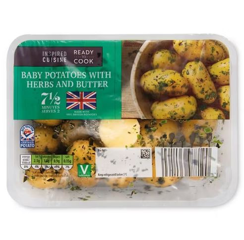 Package of baby potatoes with herbs and butter.