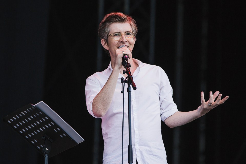 Gareth Malone performing at a music festival.