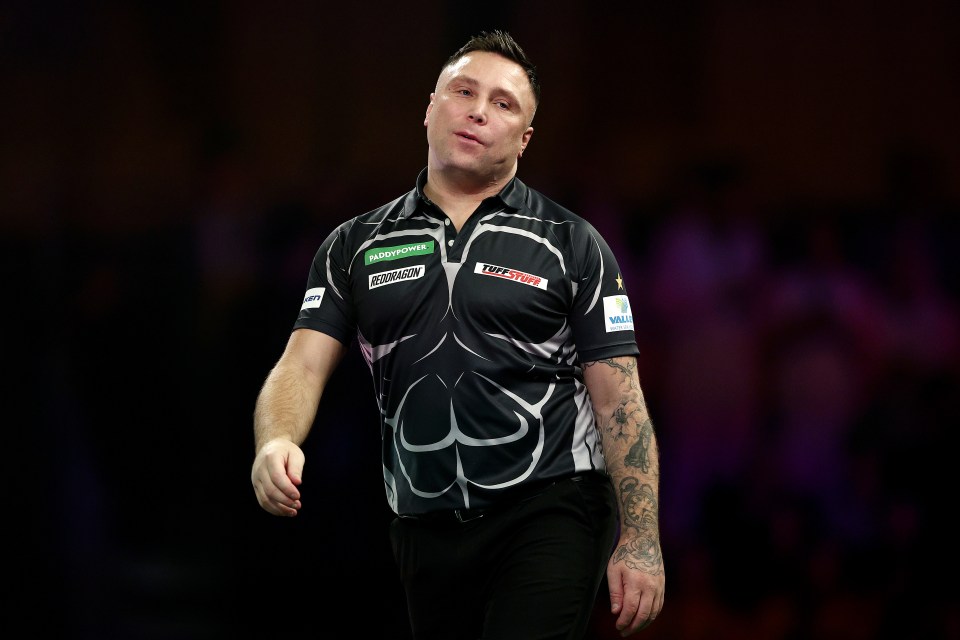 Gerwyn Price looking dejected at a darts championship.
