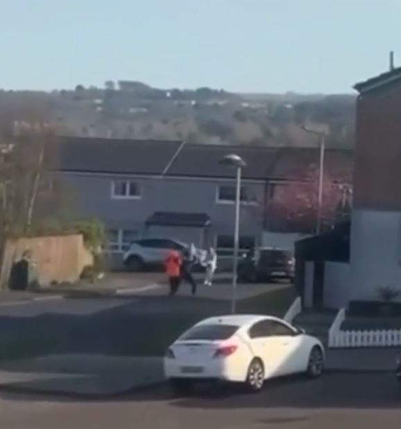People interacting in a residential area.