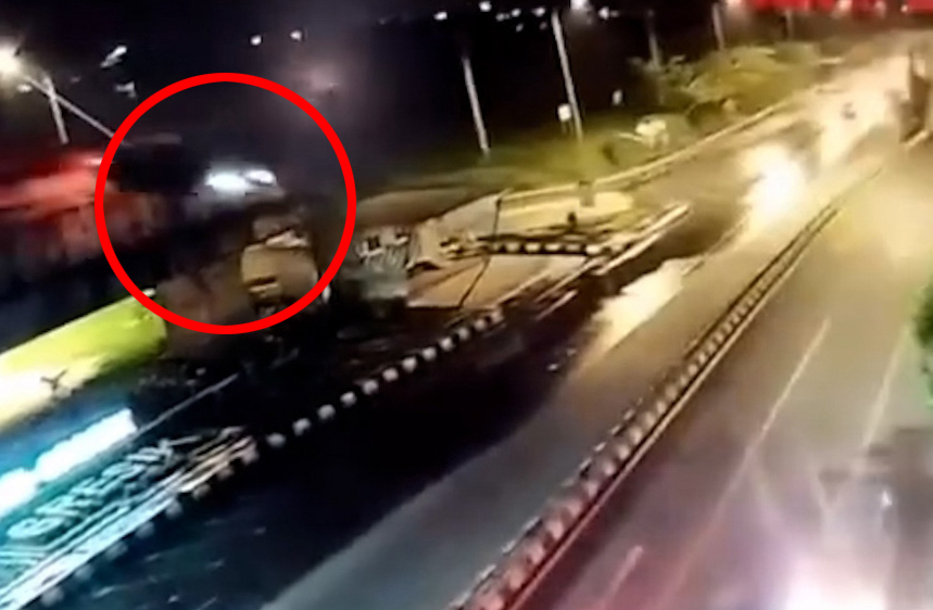 CCTV footage of a car falling from an unfinished bridge.