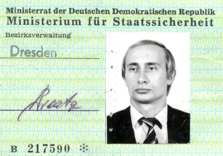 Black and white photo ID of Vladimir Putin.
