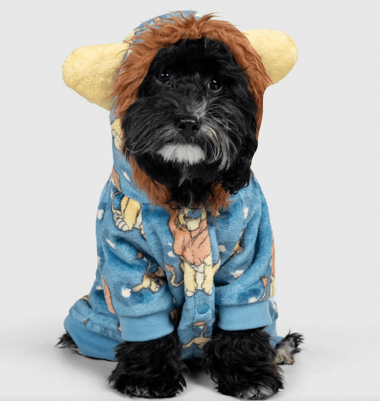 Dog in a lion king-themed pajama onesie.