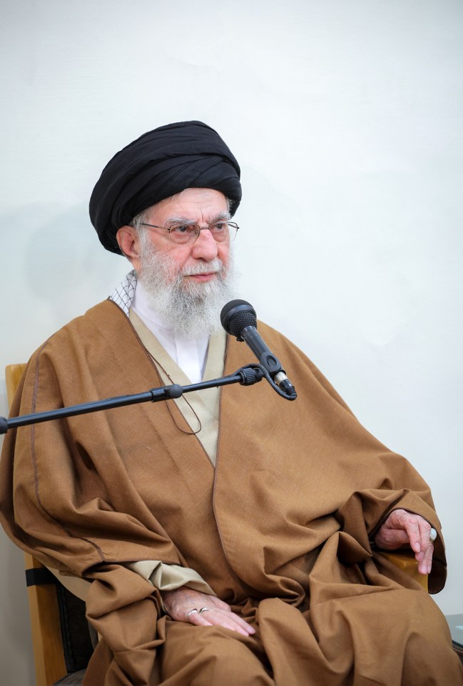 Ali Khamenei speaking at a microphone.