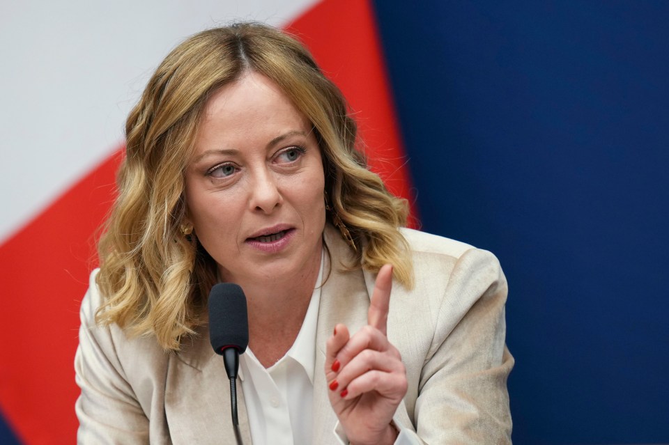 Giorgia Meloni speaking at a press conference.