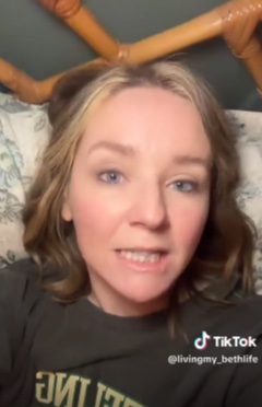 Close-up of JoJo Siwa reacting to Mickey Rourke.