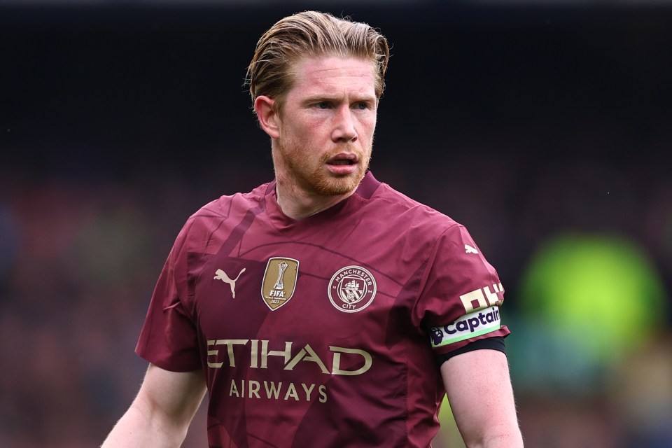 Kevin De Bruyne of Manchester City in a maroon jersey.