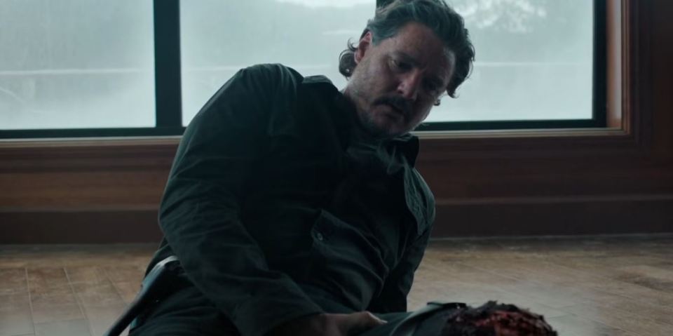 Joel Miller from The Last of Us TV series, injured and on the floor.