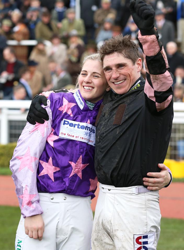 Jockey Harry Skelton celebrates a victory with Bridget Andrews.