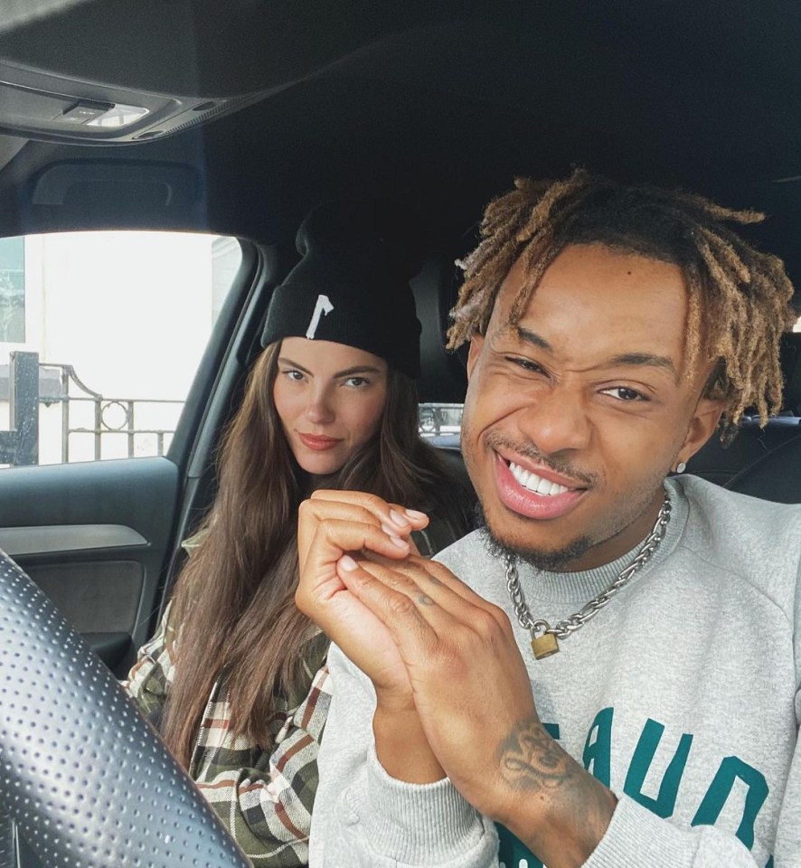 Chris Biggs and Rebecca Gormley in a car.
